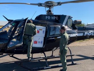 A distribuição é feita por helicóptero e por via terrestre (Foto: Divulgação Polícia Civil)