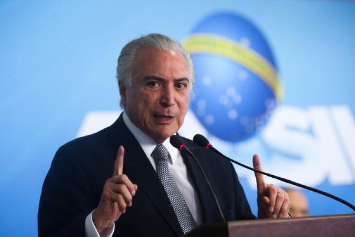 O presidente Michel Temer participa da cerimônia de assinatura da medida provisória do Programa de Manutenção e Geração de Empregos, no Palácio do Planalto